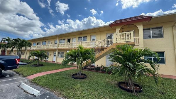 Romont South, 160 NE 203rd Ter #E20, Miami Gardens, Florida 33179, image 1