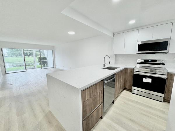 Cypress At Woodmont, 7410 Woodmont Ter #104, Tamarac, Florida 33321, image 1