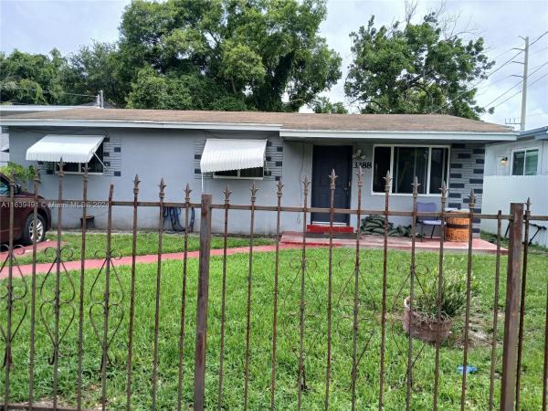 Seminole Lawn, 3388 NW 49th St, Brownsville, Florida 33142, image 1
