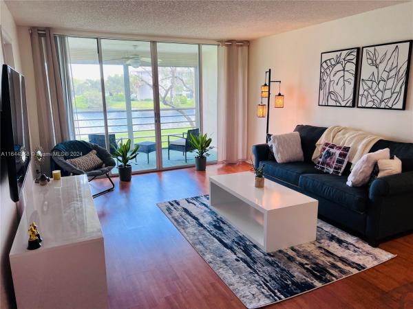 Poinciana Place Of Pine Island Ridge, 9430 Poinciana Pl #214, Davie, Florida 33324, image 1