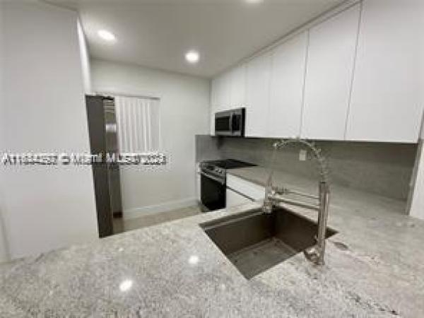 Village Of Kings Creek, 7720 Camino Real #E412, Glenvar Heights, Florida 33143, image 1