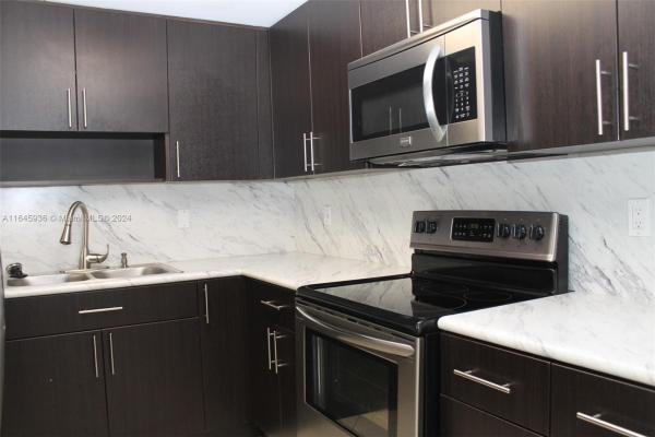 Coral Gate West, 7000 NW 186th St #4-218, Country Club, Florida 33015, image 1