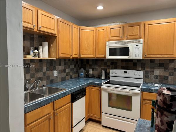 Envoy North, 467 Golden Isles Dr #108, Hallandale Beach, Florida 33009, image 1