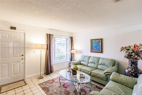 Signature Gardens, 12427 SW 121st Ave, Three Lakes, Florida 33186, image 1
