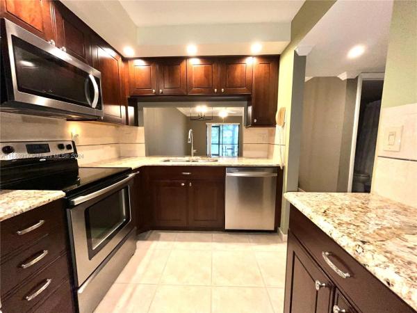 Fairview At Pembroke Pointe One, 1048 NW 106th Ter #104, Hollywood, Florida 33026, image 1