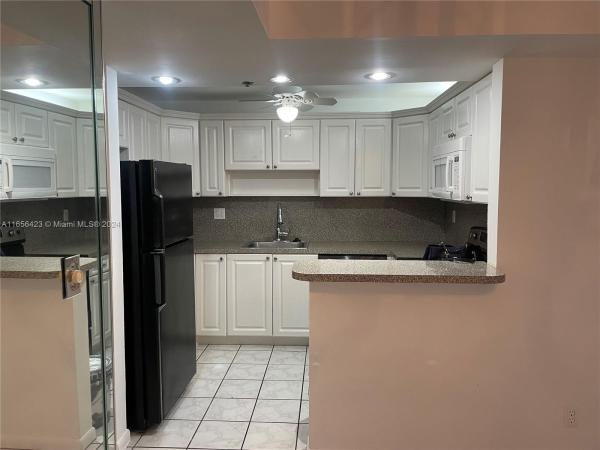 Rolling Hills Golf And Tennis Club, 3100 W Rolling Hills Cir #108, Davie, Florida 33328, image 1
