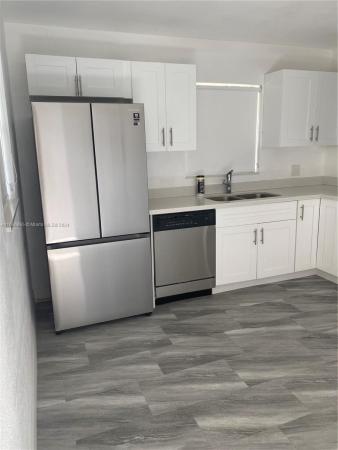Villas At Carriage Hills Lakeside, 200 Berkley Rd #107, Hollywood, Florida 33024, image 1
