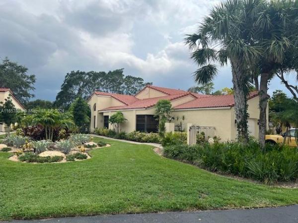 Villas On The Green, 2672 N Deer Creek Emerald Way N, Deerfield Beach, Florida 33442, image 1