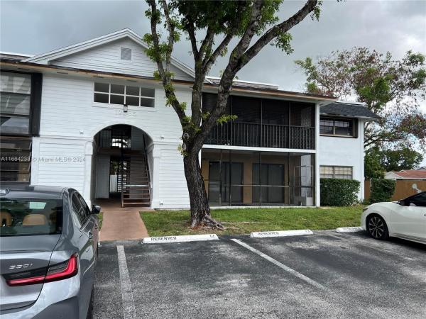 Countryside Village, 19085 NW 62nd Ave #108, Country Club, Florida 33015, image 1