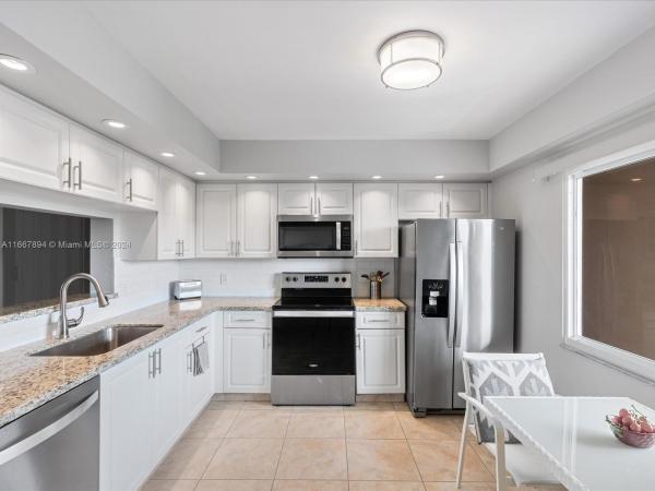 Suffolk At Century Village, 13705 SW 12th St #406B, Pembroke Pines, Florida 33027, image 1
