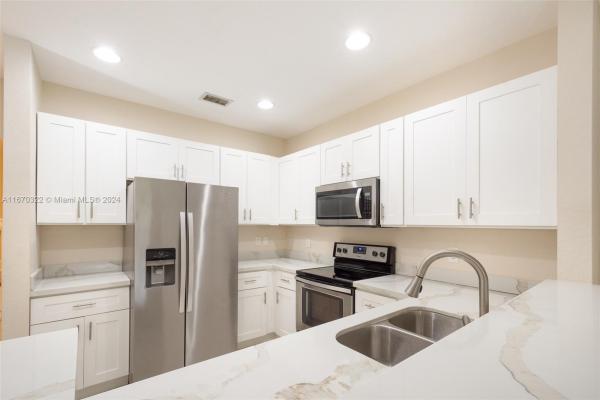 Carriage Homes At Bentley Park, 2934 NW 33rd Way, Lauderdale Lakes, Florida 33311, image 1