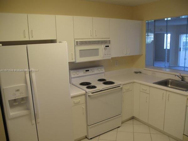 Weldon, 9511 Weldon Cir #G402, Tamarac, Florida 33321, image 1