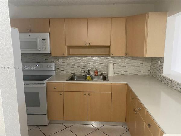 Westland Courts, 1855 W 60th St #208, Hialeah, Florida 33012, image 1