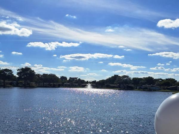 Villas At Carriage Hills Lakeside, 300 Cambridge Rd #1-35, Hollywood, Florida 33024, image 1