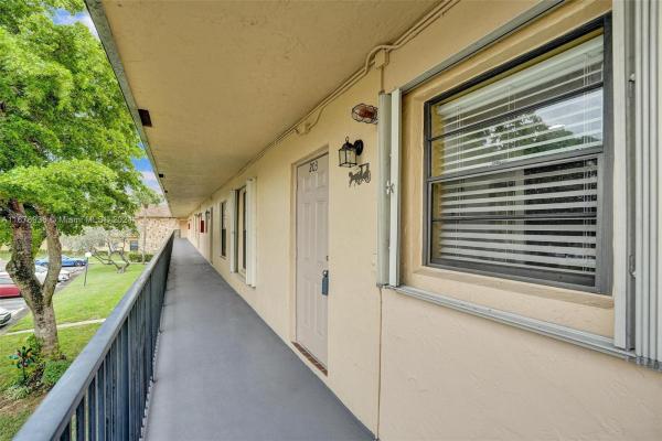 Villas At Carriage Hills Lakeside, 200 Berkley Rd #203, Hollywood, Florida 33024, image 1