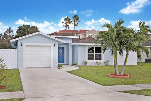 Hillsboro Estates, 155 Dabou Loop, Belle Glade, Florida 33430, image 1