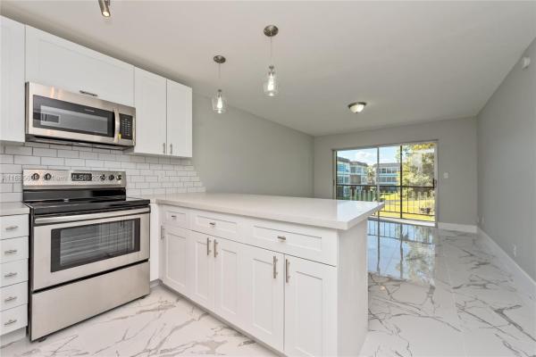 Omega, 1801 NW 75th Ave #203, Plantation, Florida 33313, image 1