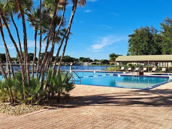 Villas At Carriage Hills Lakeside, 275 Gate Rd #111, Hollywood, Florida 33024, image 1