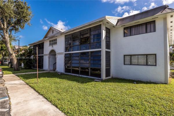 Countryside Village, 18785 NW 62nd Ave #107, Country Club, Florida 33015, image 1