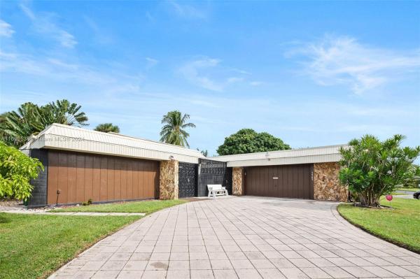 The Woodlands, 5905 Cedar Cir, Tamarac, Florida 33319, image 1