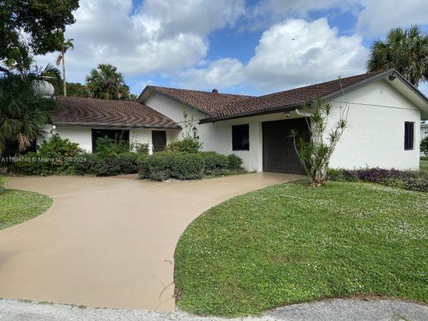 The Woodlands, 6205 Jacaranda Cir, Tamarac, Florida 33319, image 1