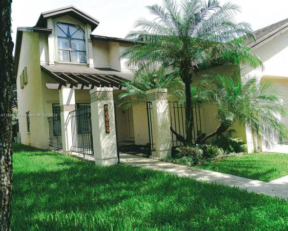 Valencia Townhomes, 13707 SW 100th Ter #13707, The Hammocks, Florida 33186, image 1