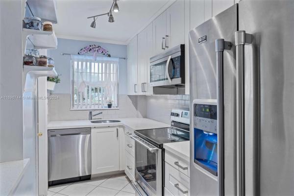 Paradise Villas, 501 Blue Heron Dr #202-A, Hallandale Beach, Florida 33009, image 1