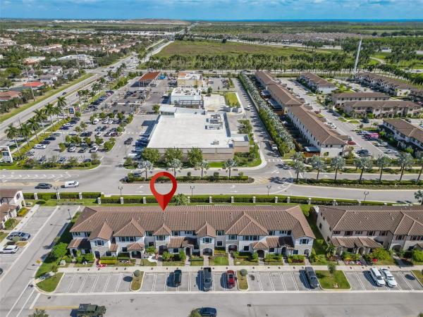 Coco Palm Villas At Isola, 24847 SW 113th Pl 0, South Miami Heights, Florida 33032, image 1