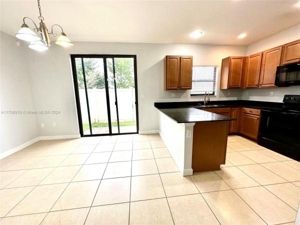 Champion Lakes, 408 NE 194th Ter, Ives Estates, Florida 33179, image 3