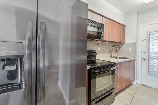 Carolynn Townhouse, 11 SW 52nd Ave #6C, Miami, Florida 33134, image 2