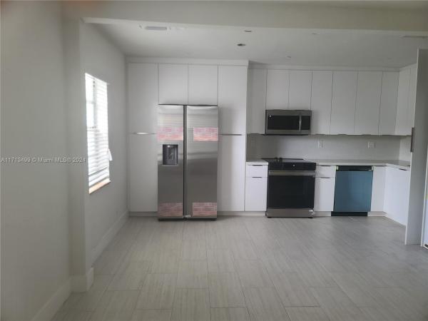Comfort Gardens, 1041 NW 32nd Pl, Miami, Florida 33125, image 1