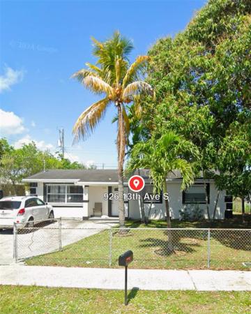 Whispering Palms, 926 S 13th Ave S, Lake Worth Beach, Florida 33460, image 1