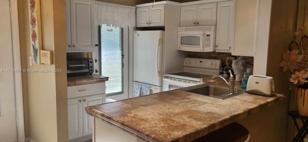 Tulip Gardens, 5001 NW 34th St #103, Lauderdale Lakes, Florida 33319, image 1