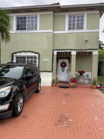 Precious Homes At Twin Lakes, 13374 SW 143rd Ter, Three Lakes, Florida 33186, image 1
