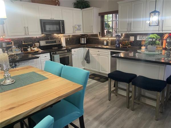 Precious Homes At Twin Lakes, 13374 SW 143rd Ter, Three Lakes, Florida 33186, image 2