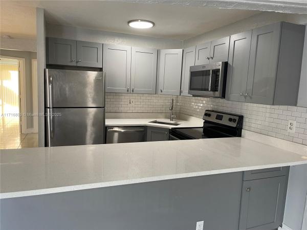 Orchard Lake Townhouses, 2437 NW 55th Ter #2437, Lauderhill, Florida 33313, image 1