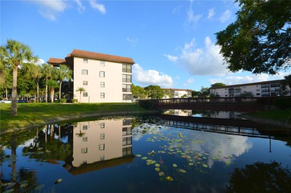 Lakes Of Carriage Hills, 4960 E Sabal Palm Blvd #211, Tamarac, Florida 33319, image 1
