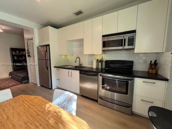 Royal Palm Gardens, 8220 NE 1st Pl #B, Miami, Florida 33138, image 1