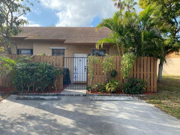 Country Lake Manors Townhomes, 18960 NW 67th Pl 0, Hialeah, Florida 33015, image 1
