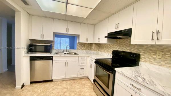 Sherwood Square, 1200 NW 87th Ave #410, Coral Springs, Florida 33071, image 1
