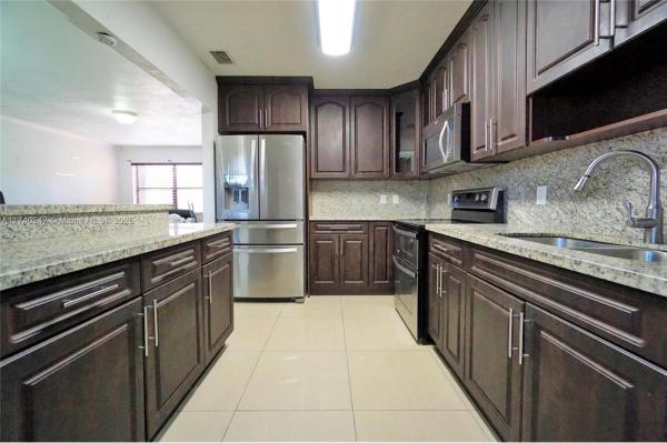 Lago Grande, 6331 W 24th Ct #104-4, Hialeah, Florida 33016, image 1