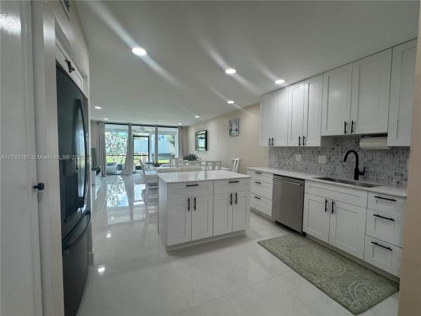 D'Este Court At The Fountains Of Palm Beach, 4236 Deste Ct #104, Lake Worth Beach, Florida 33467, image 1