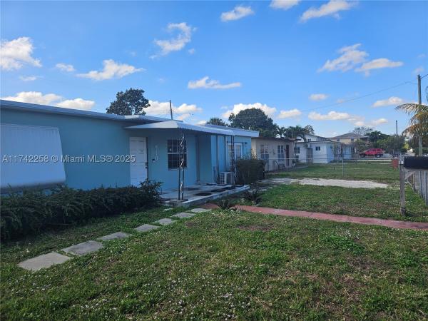 Sun Tan Village, 910 E 11th Pl, Hialeah, Florida 33010, image 1