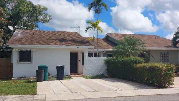 Aileen Susan, 10805 SW 146th Pl, The Hammocks, Florida 33186, image 1