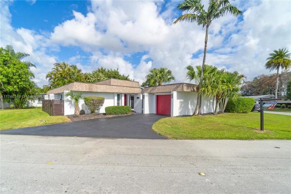 The Woodlands, 5601 White Cedar Ln, Tamarac, Florida 33319, image 1