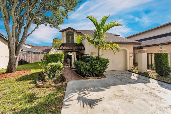 Valencia Townhomes, 10291 SW 137th Pl, The Hammocks, Florida 33186, image 1