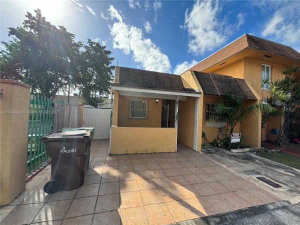 Sparrow Woods Townhouses, 2350 W 53rd Ter #12, Hialeah, Florida 33016, image 1