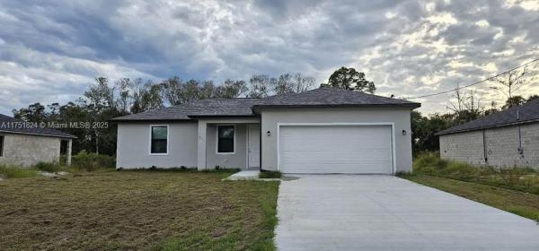 611 Greenbriar Blvd, Lehigh Acres, Florida 33972, image 1