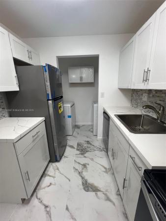 Carmel Lakes, 469 NE 207th Ln #102, Ives Estates, Florida 33179, image 2