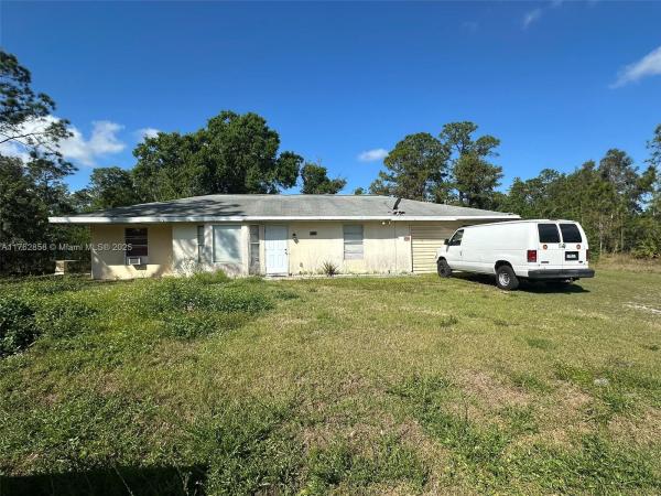 909 Canton Ave, Lehigh Acres, Florida 33972, image 1